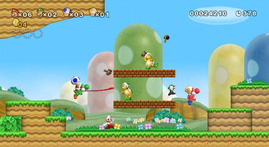 New Super Mario Bros Wii - A quatre