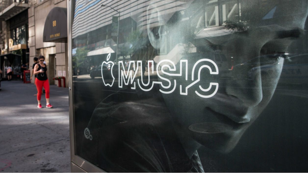 NEW YORK, NY - AUGUST 07: An advertisement for Apple Music is posted on the streets of Manhattan on August 7, 2015 in New York City. After launching in June Apple announced it has attracted 11 million users during its trial period. 