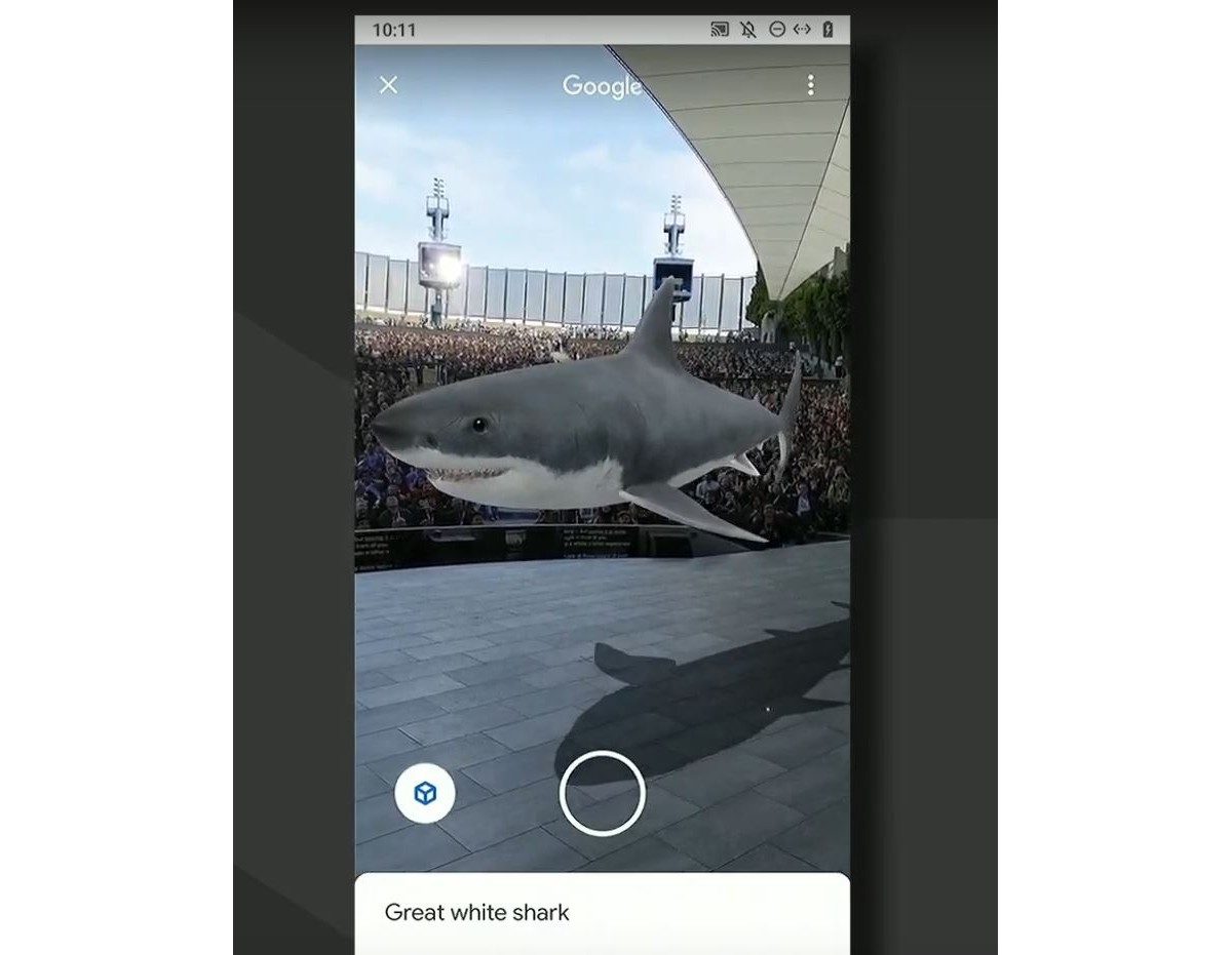 Le requin inséré en 3D sur la scène de la conférence.