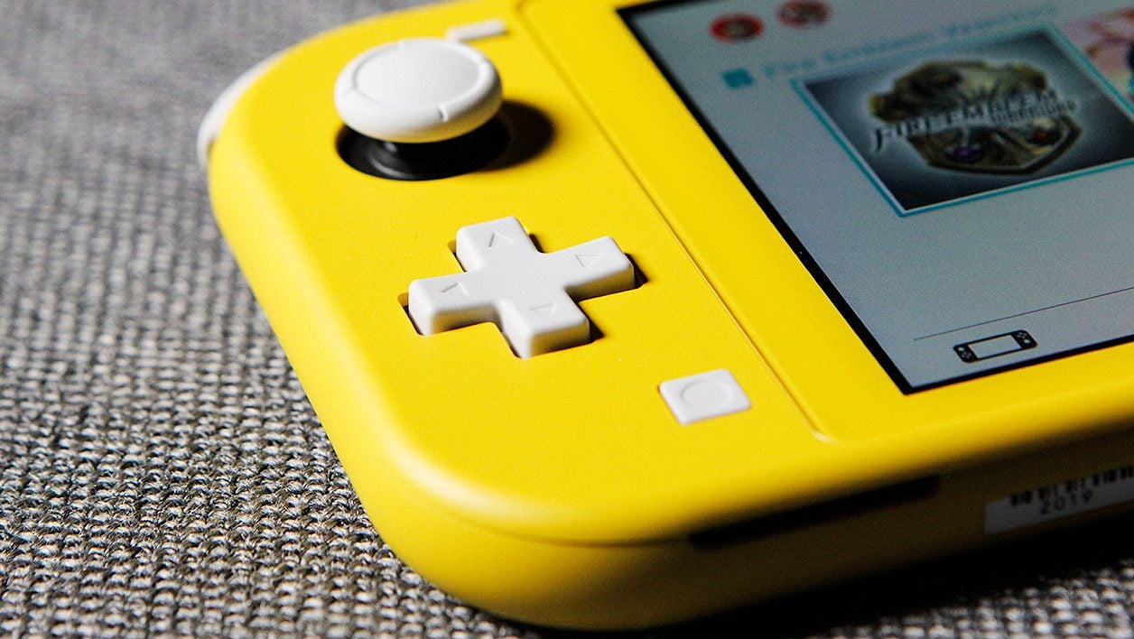 Console switch lite jaune + jeu switch scribblenauts+ pat