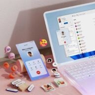 Msft Open Laptop With Mobile Phone Floating Emojis